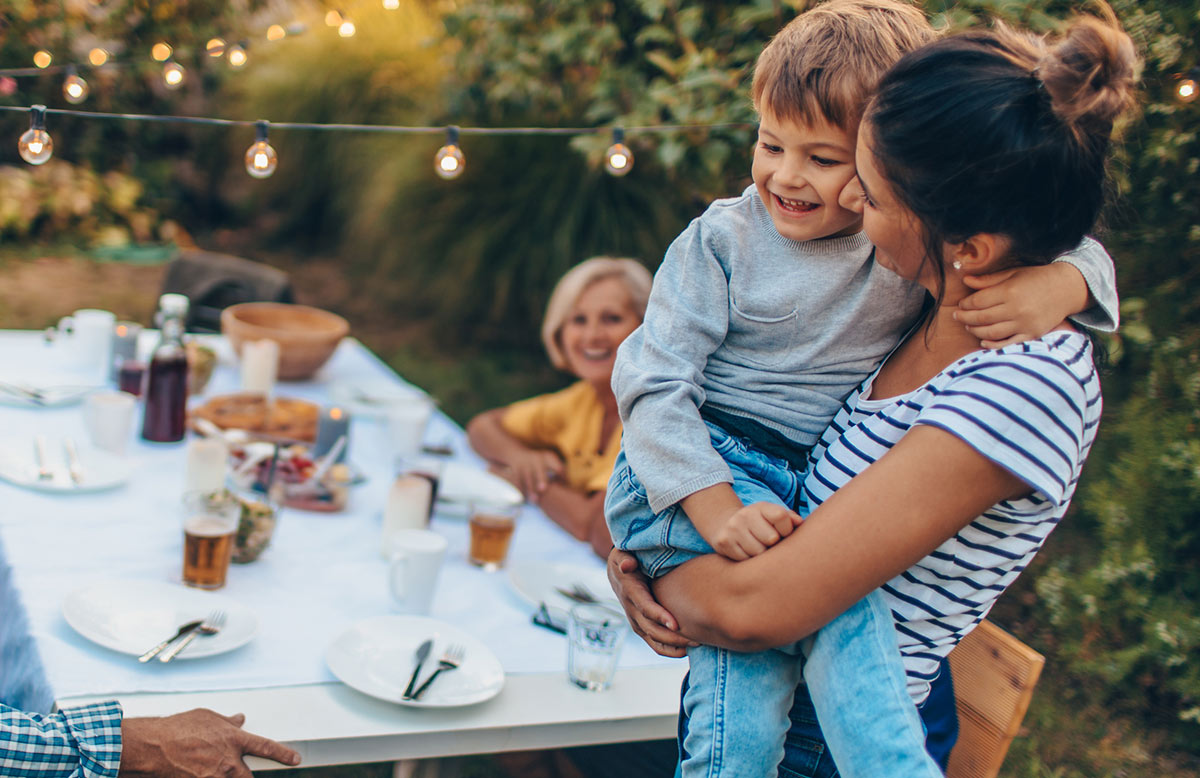 Mom and son backyard bbq