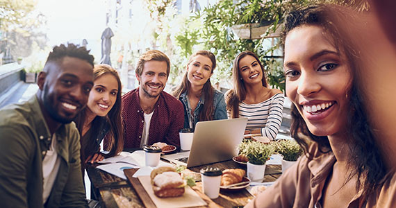 Friends at lunch taking selfie